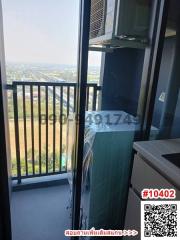 Balcony with city view and air conditioning unit