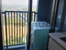 Balcony with city view and air conditioning unit