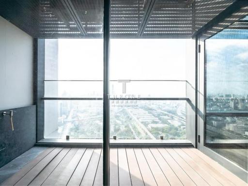 Modern balcony with glass balustrade overlooking the city