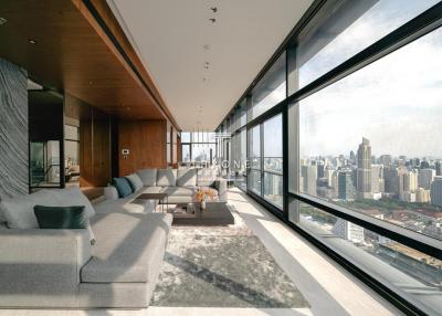 Modern living room with large windows and city view