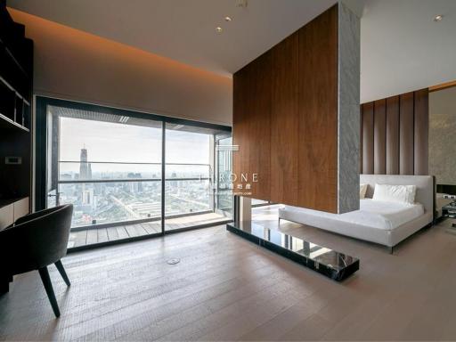 Modern bedroom with large window and city view