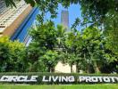 Lush greenery in front of Circle Living Prototype residential building