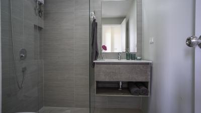 Modern bathroom with walk-in shower and stylish vanity