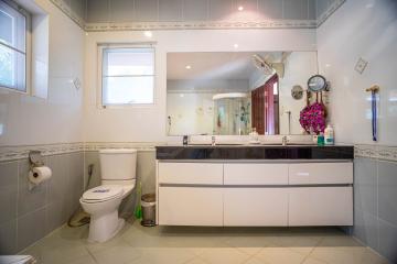 Modern bathroom interior with vanity and toilet