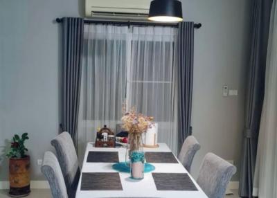 Modern dining room with a well-set table and elegant decor