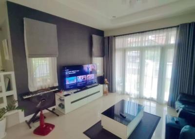 Modern living room with natural light and contemporary furniture