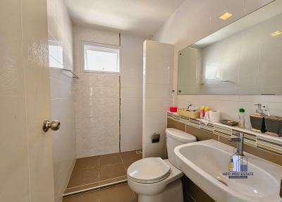 Modern bathroom with shower and vanity