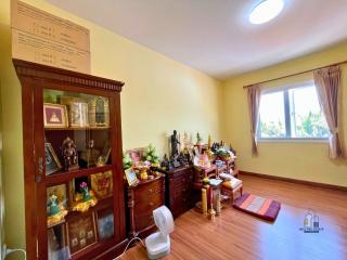 Cozy bedroom with traditional decor and wooden furniture