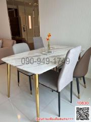 Modern dining room with table set for four