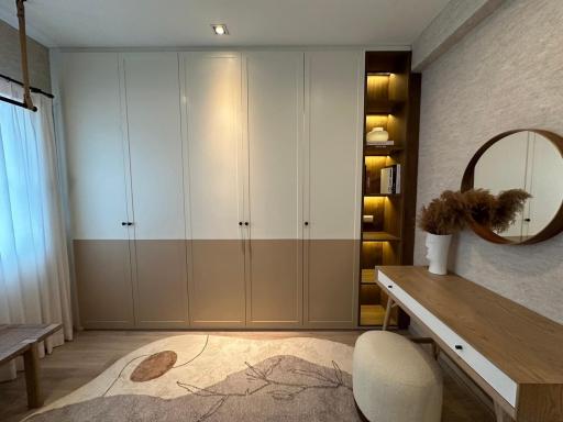 Cozy modern bedroom interior with built-in wardrobes and elegant decor