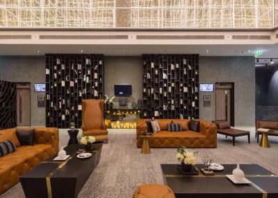 Elegant hotel lobby with modern furnishings and plush seating