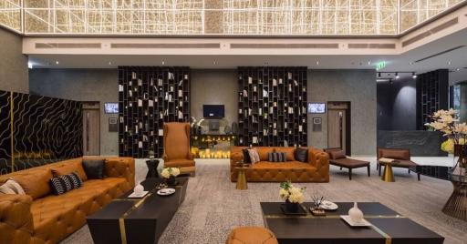 Elegant hotel lobby with modern furnishings and plush seating