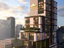 Modern high-rise residential building with balconies and rooftop gardens at dusk