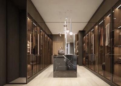 Modern and luxurious walk-in closet with ample storage and elegant design