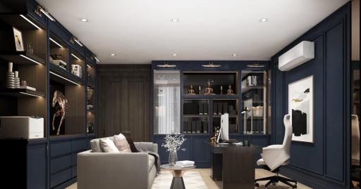 Modern home office with dark blue walls, wooden shelves, and a comfortable chair