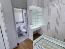 Compact bedroom with built-in wardrobes and ensuite bathroom