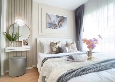 Elegant modern bedroom with natural light and tasteful decor