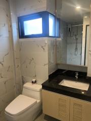 Modern bathroom interior with marble tiles