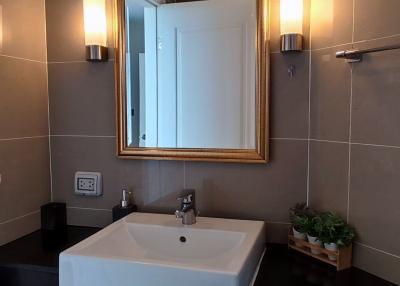 Modern bathroom with sleek design and warm lighting