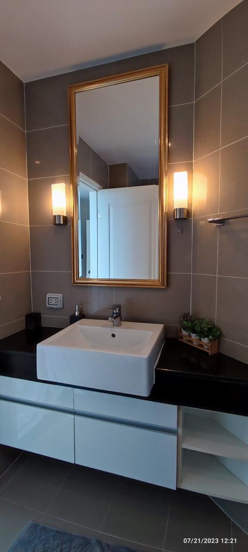 Modern bathroom with sleek design and warm lighting