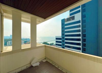 Spacious balcony with a city and water view