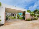 Modern home exterior with lush garden and welcoming entrance