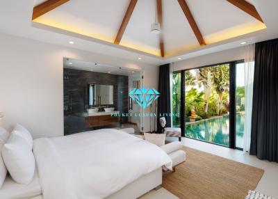 Spacious bedroom with modern design overlooking a lush garden