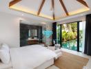 Spacious bedroom with modern design overlooking a lush garden