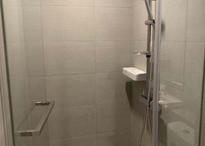 Modern bathroom with glass shower cabin