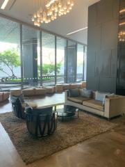 Modern lobby area with comfortable seating and natural light