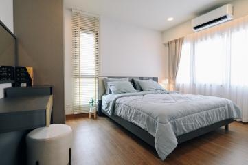 Modern spacious bedroom with natural light