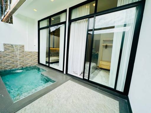 Private outdoor plunge pool with direct access to the master bedroom through sliding glass doors