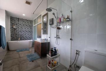 Modern bathroom with shower and bathtub
