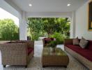 Spacious and well-furnished outdoor living area with comfortable seating