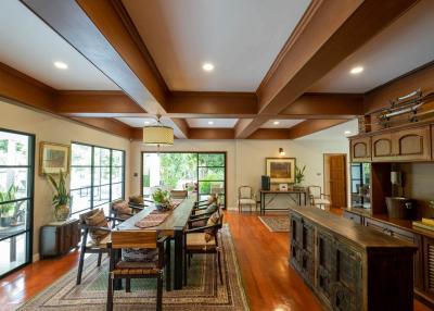 Spacious and elegantly furnished living room with natural lighting