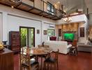 Spacious living room with high ceiling and mezzanine