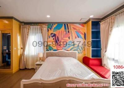 Colorful and modern bedroom interior with artistic wall mural