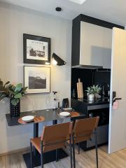 Modern kitchen with dining area and elegant decor