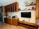 Modern kitchen with integrated appliances and wooden cabinetry