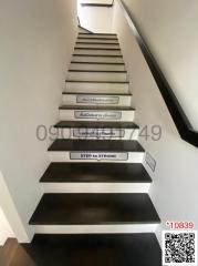 Modern Staircase with Inspirational Quotes on Steps
