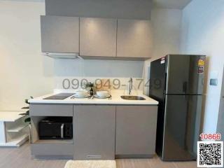 Modern kitchen with stainless steel appliances and ample cabinet space