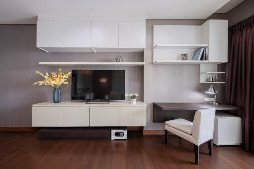 Modern living room with integrated entertainment unit and minimalist decor