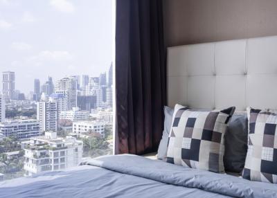 Cozy bedroom with city view