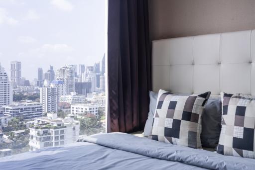 Cozy bedroom with city view
