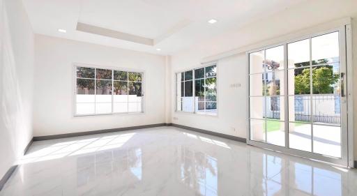 Bright and spacious living room with large windows