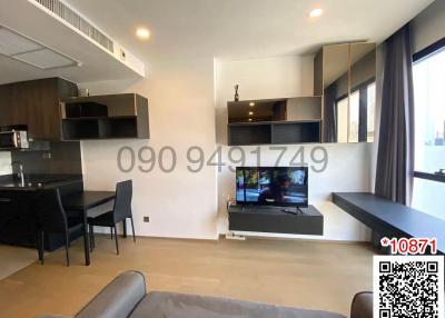 Modern living room interior with entertainment unit and ample seating