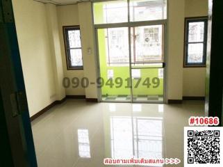 Spacious unfurnished room with glossy tiled flooring and large windows