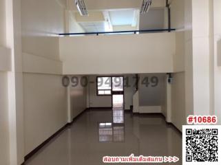 Spacious empty interior of a new building with natural light from skylights