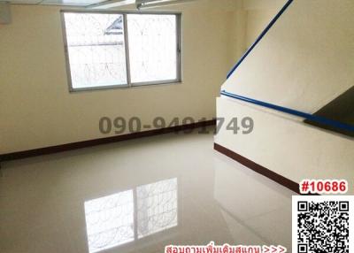 Bright empty room with tiled floor and windows