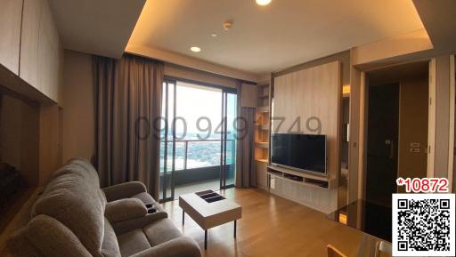 Modern living room with comfortable sofa and city view